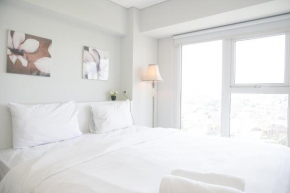 Comfy and Spacious 2BR Loft Apartment Maqna Residence By Travelio